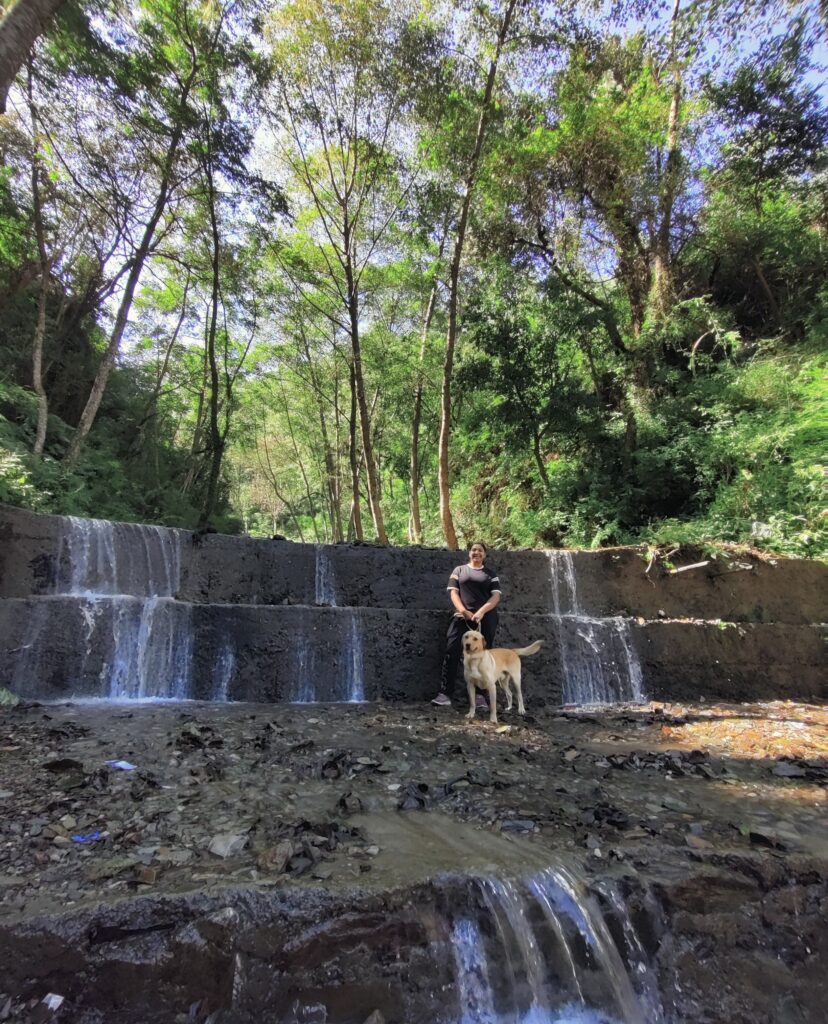 Mojo and Kajal near waterfall